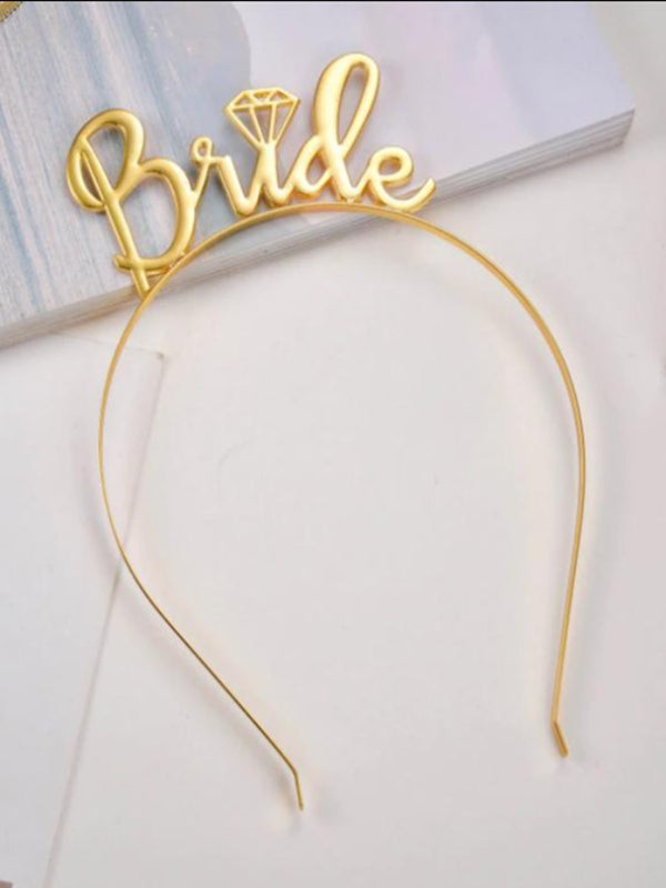 gold headband with bride on the top