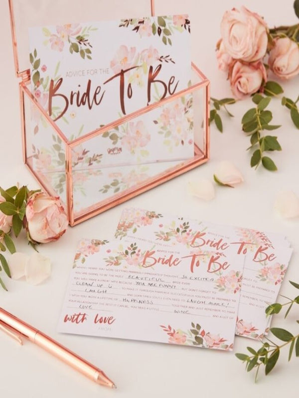 hen party game with floral and rose gold advice for the bride cards.