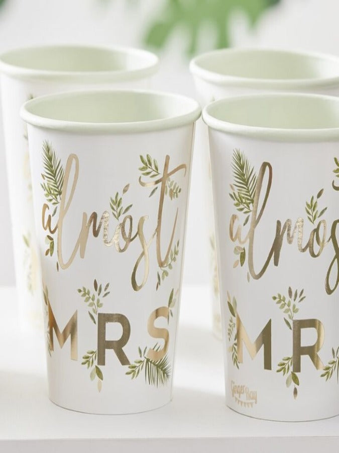 8 white hen party paper cups with botanical design and Almost MRS gold foil text 