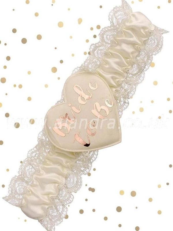 Cream lace garter with rose gold Bride To  foil logo 