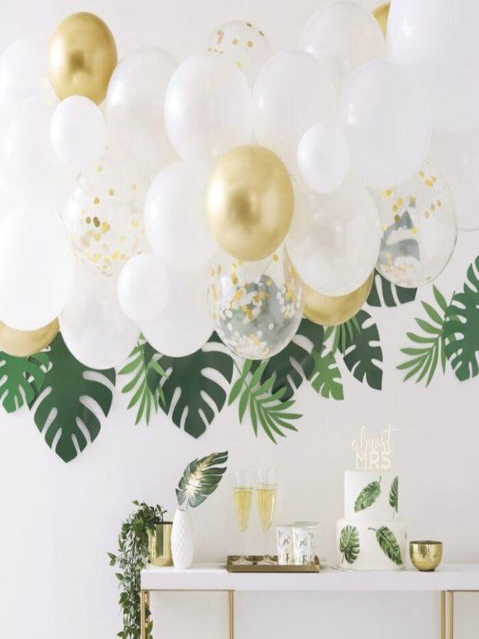 55 varied size balloons. Gold,cream and white to make balloon arch