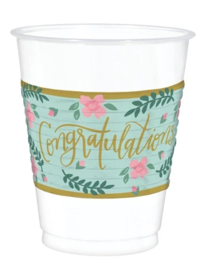 These white plastic cups feature a wraparound design that reads "Congratulations" in in a gold shade on a mint green background, with gold lines, pink flowers, and green leaves on the top and bottom