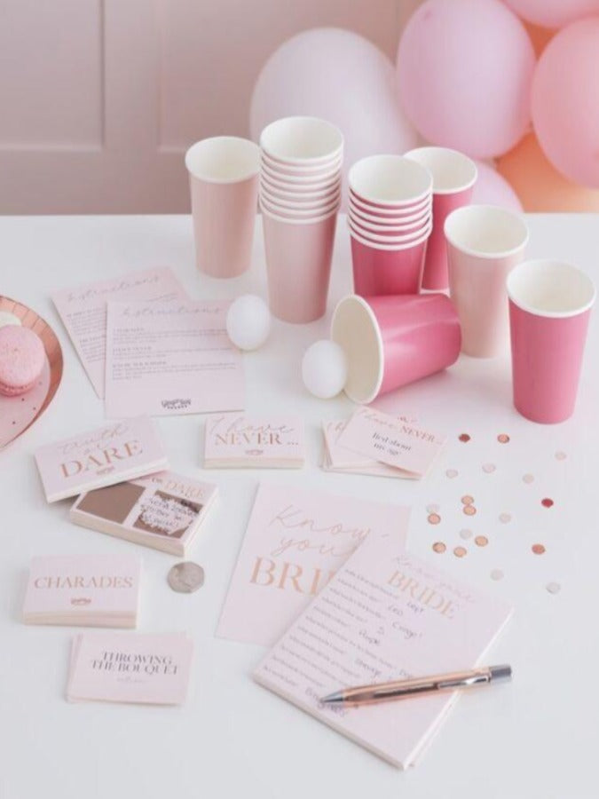 5 fun hen party games including: 20 cups and 2 pong balls 20 I have never cards 20 charades cards 20 truth or dare cards 10 know your bride cards and 1 instruction sheet.