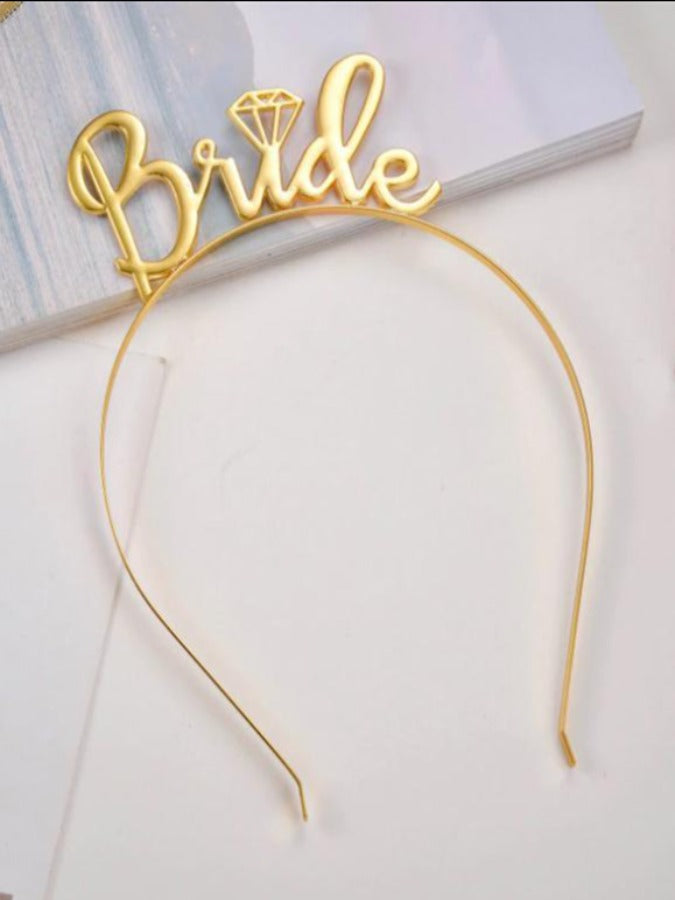gold headband with bride on the top
