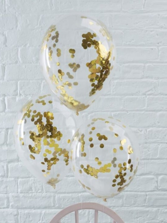 transparent coloured balloons with gold confetti inside 